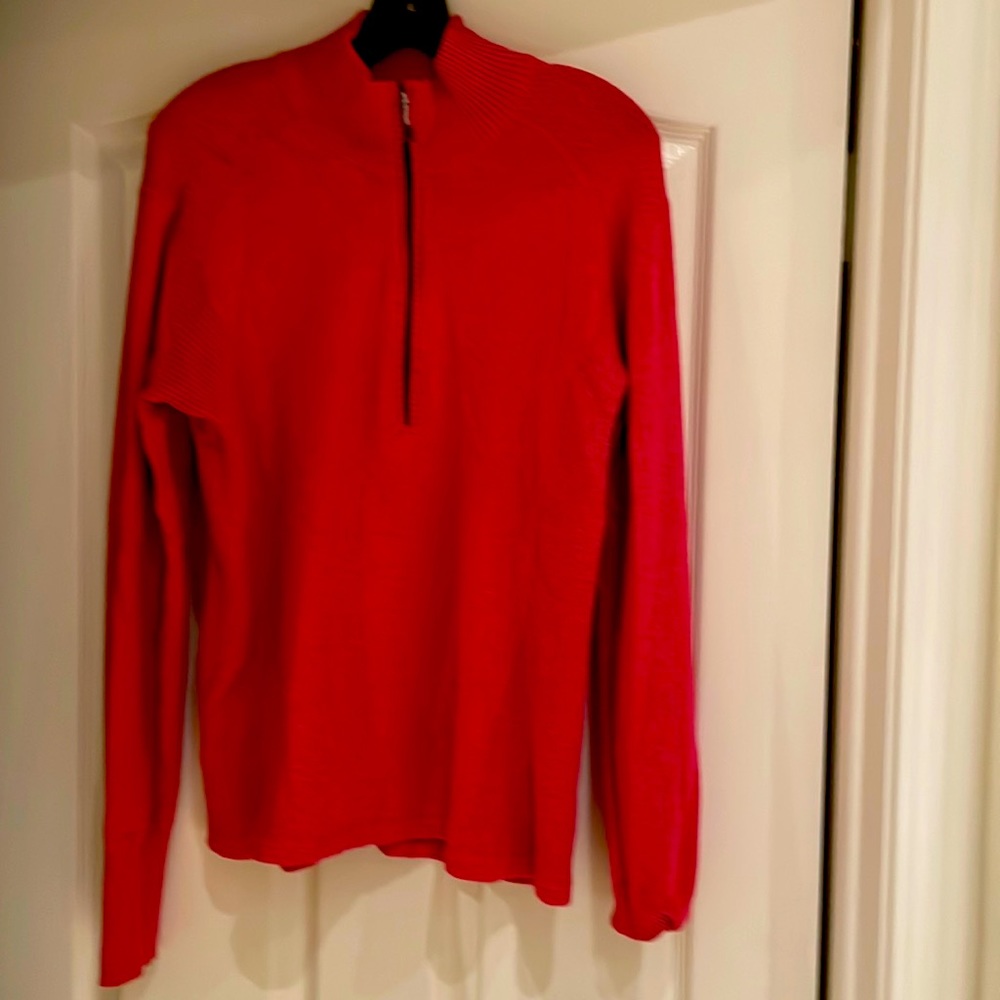 Salmon colored zippered lightweight sweater